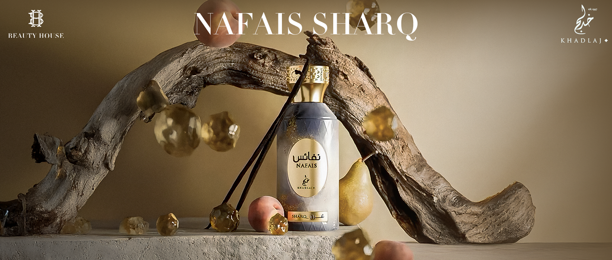 Nafais Sharq fragrance showcased with fruits, amber-like crystals, and driftwood.