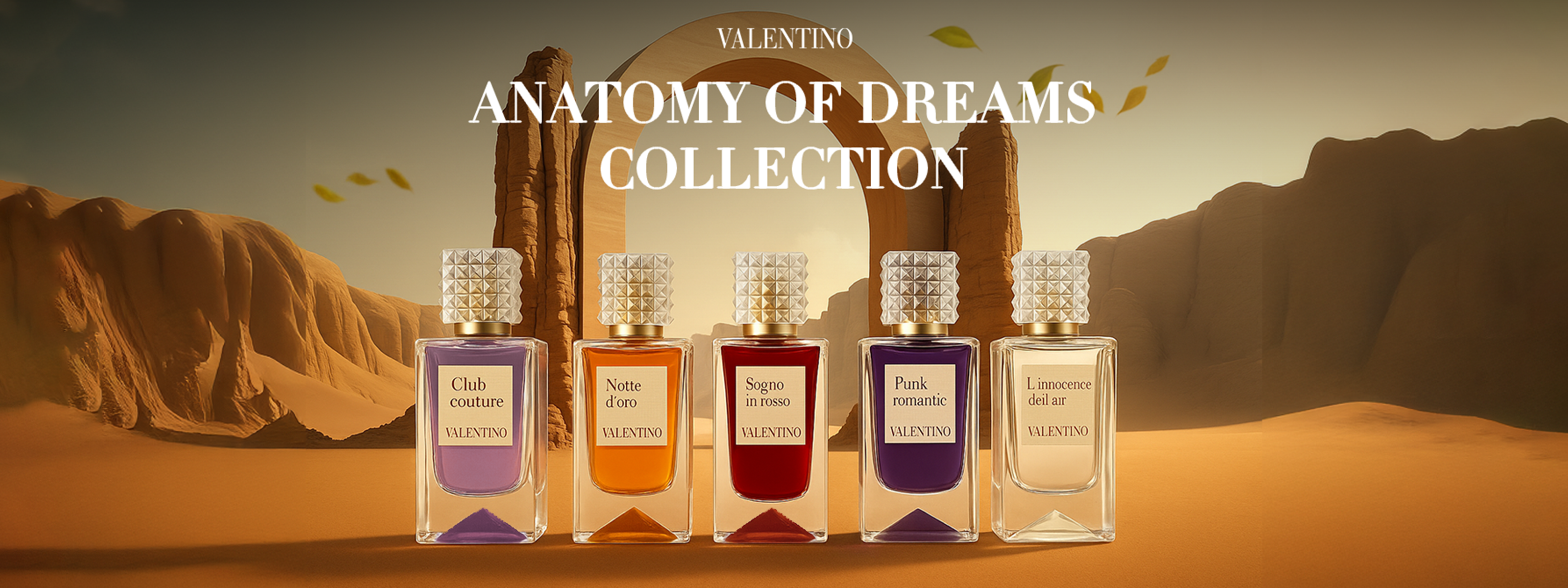 Valentino Anatomy of Dreams Collection with five colorful perfume bottles in desert backdrop.