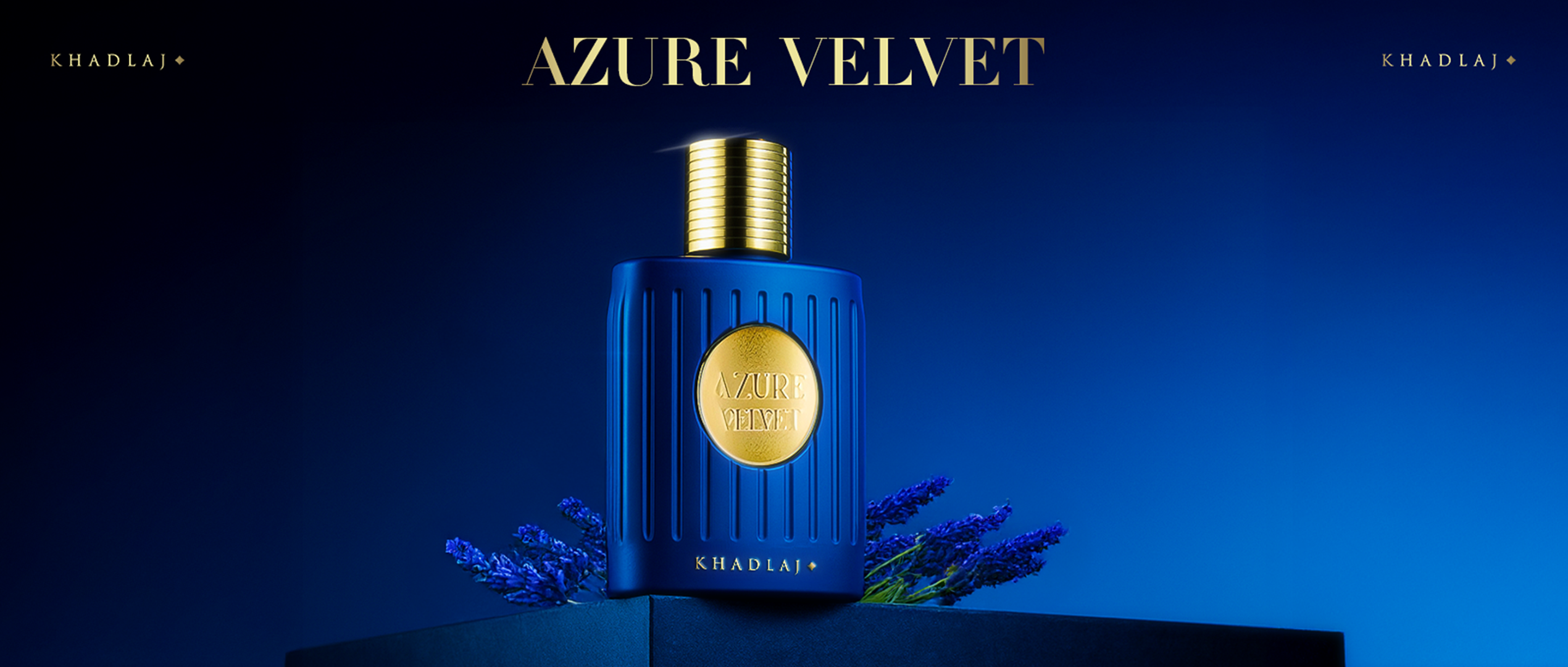 Azure Velvet perfume bottle in deep blue background with gold font design.