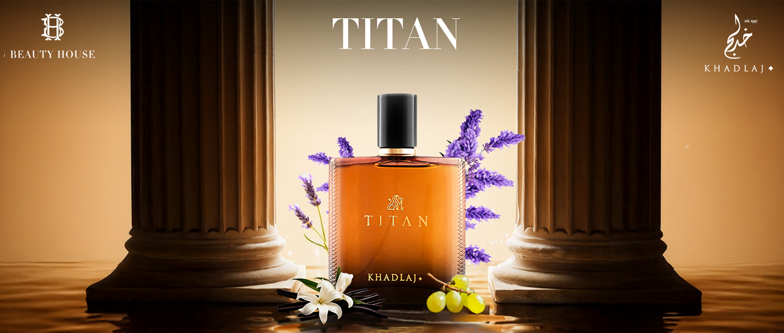 Khadlaj Titan perfume bottle displayed between stone pillars with lavender, white flowers, and grapes.