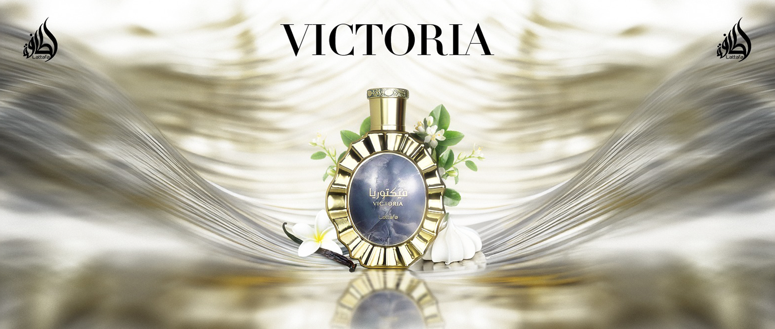 Lattafa Victoria perfume bottle with a gold-framed design, showcased on a flowing silver and white silk background with floral accents.