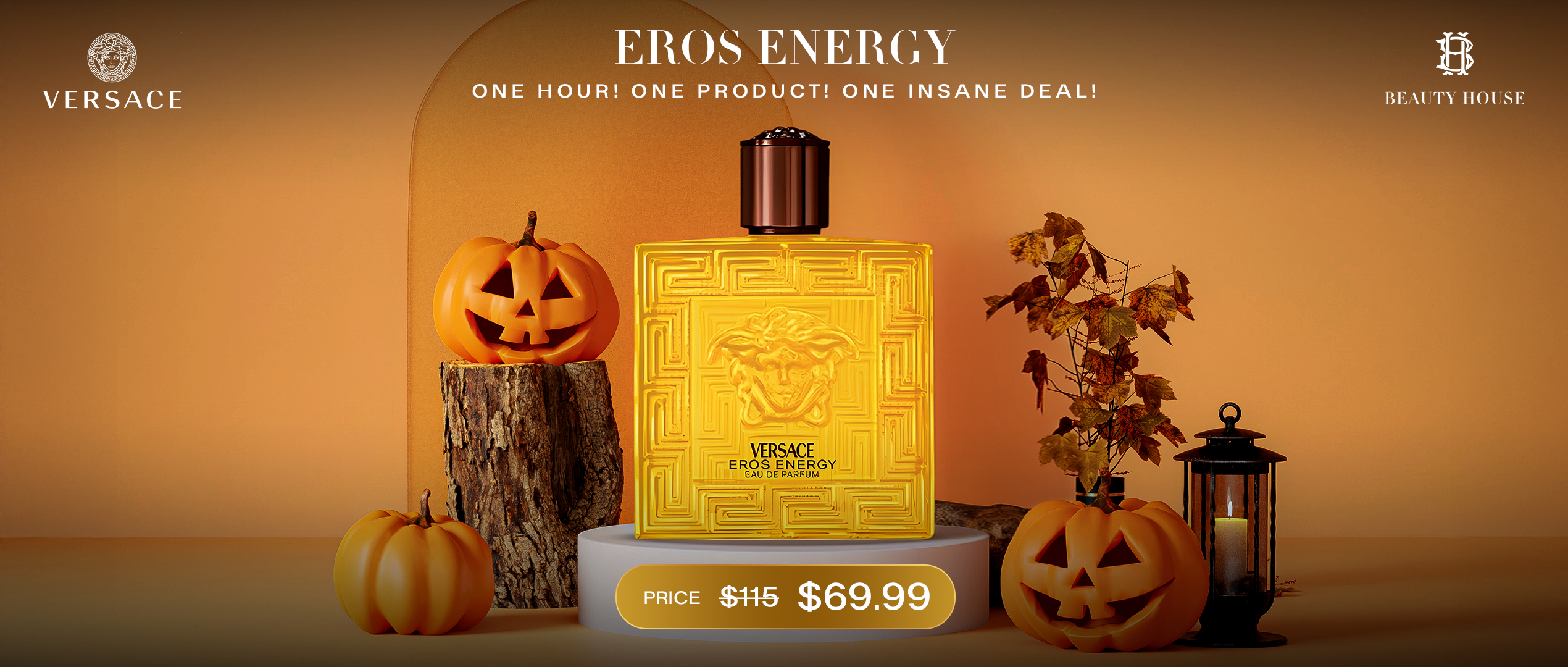 A bright Halloween-themed scene featuring Versace Eros Energy perfume. The yellow bottle stands out amid carved pumpkins, autumn leaves, and a glowing lantern, all set against a warm orange background that captures a festive yet luxurious vibe.