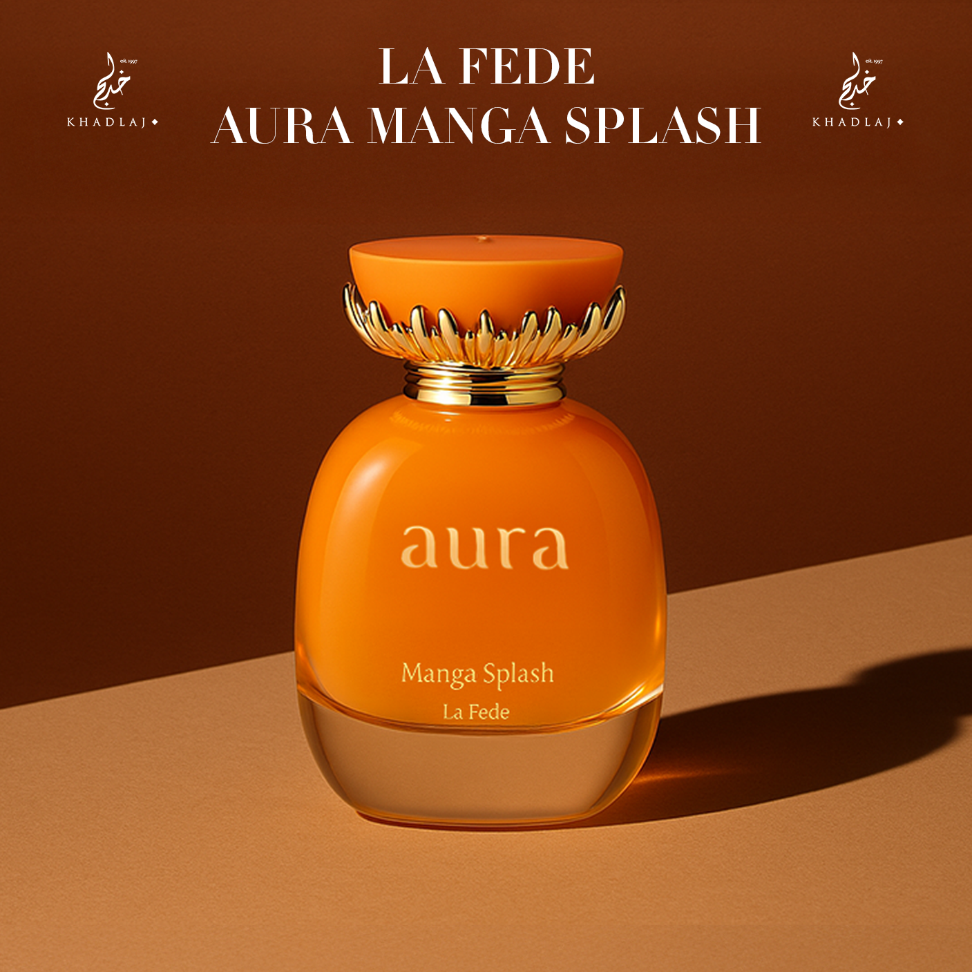 A bright orange perfume bottle labeled “Aura Manga Splash” stands on a warm brown background, glowing with a tropical, mango-inspired elegance.