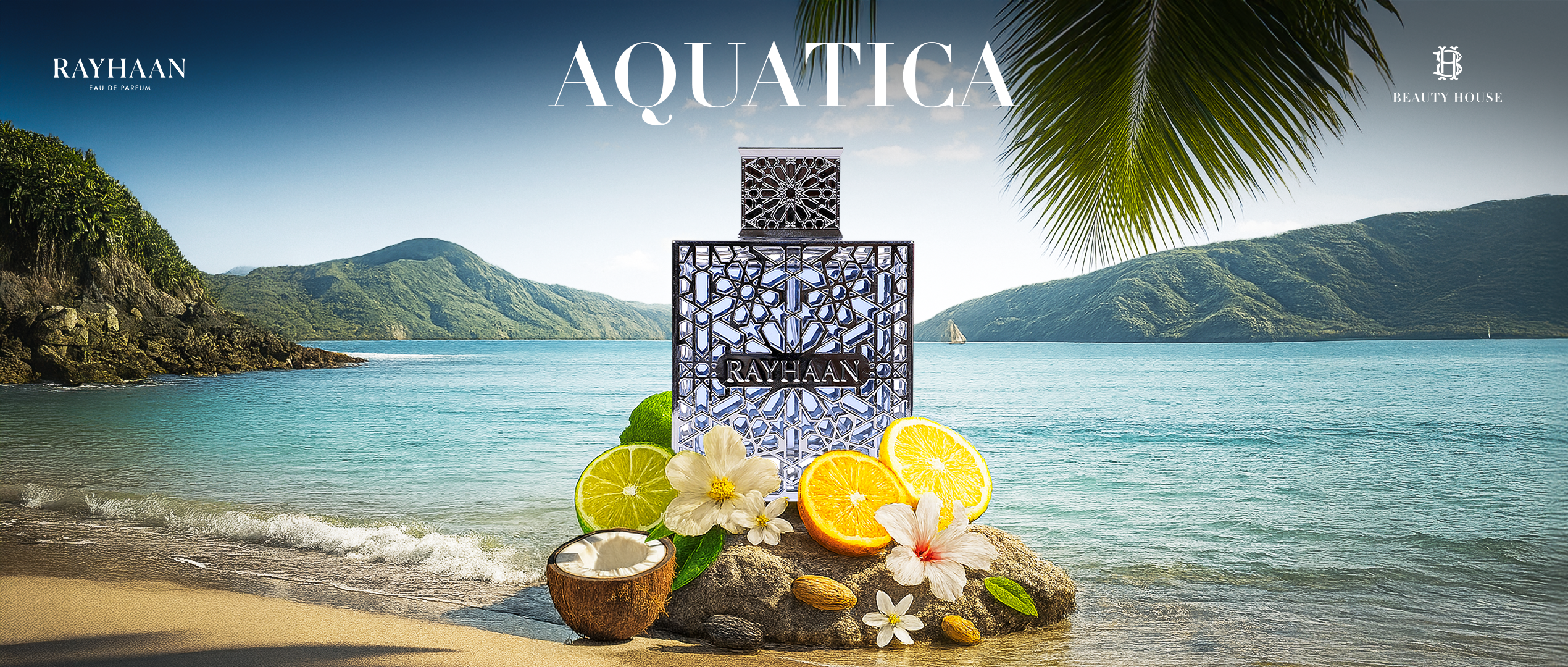 A serene tropical beach scene featuring the Rayhaan Aquatica perfume bottle placed on a rock surrounded by fresh fruits, coconuts, and white flowers. The turquoise ocean, golden sand, and palm leaves create a refreshing coastal atmosphere under a clear blue sky.