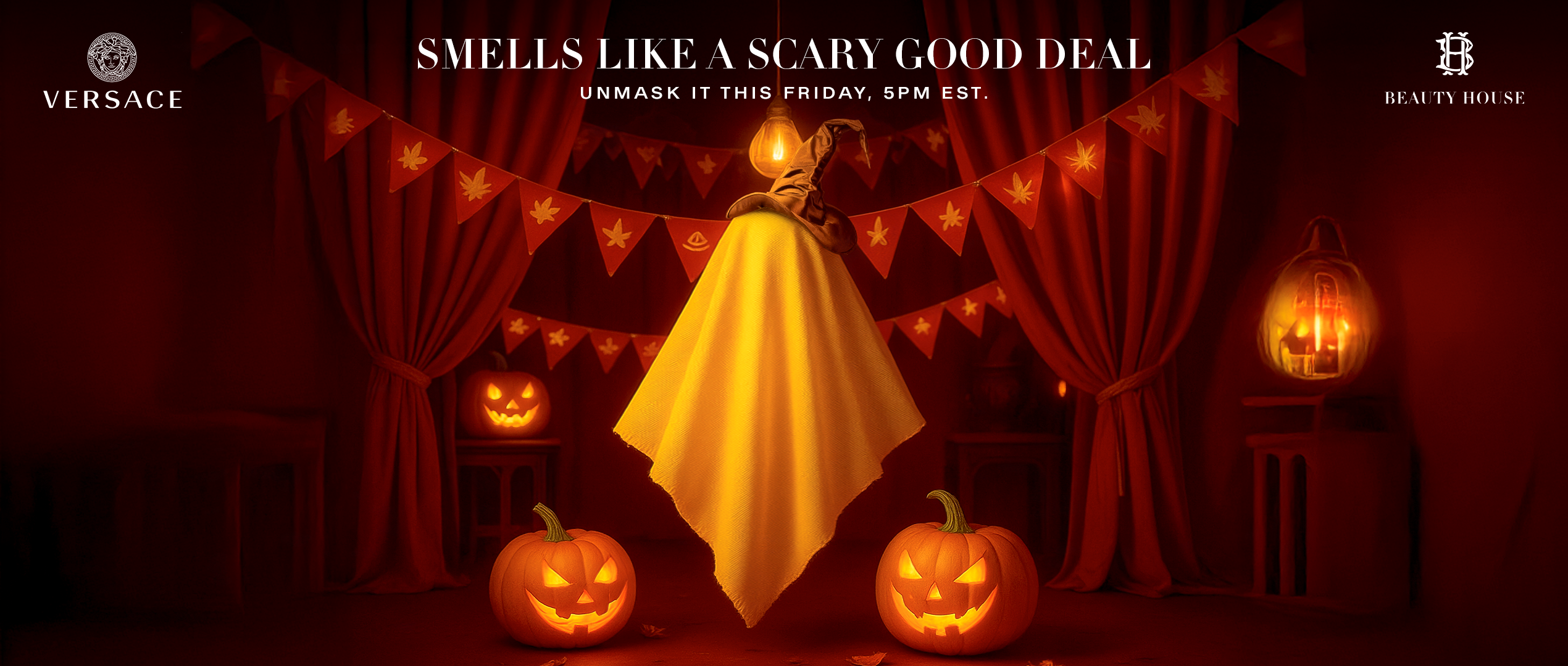A festive Halloween-themed scene featuring glowing jack-o'-lanterns, red curtains, and hanging banners in warm orange light. At the center, a mysterious object draped in yellow cloth with a witch hat hints at a hidden product reveal.