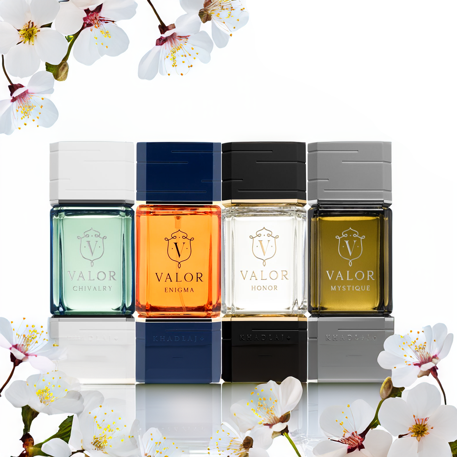 Four Khadlaj Valor perfume bottles—Chivalry, Enigma, Honor, and Mystique—stand in a row surrounded by white cherry blossoms, symbolizing elegance and strength.
